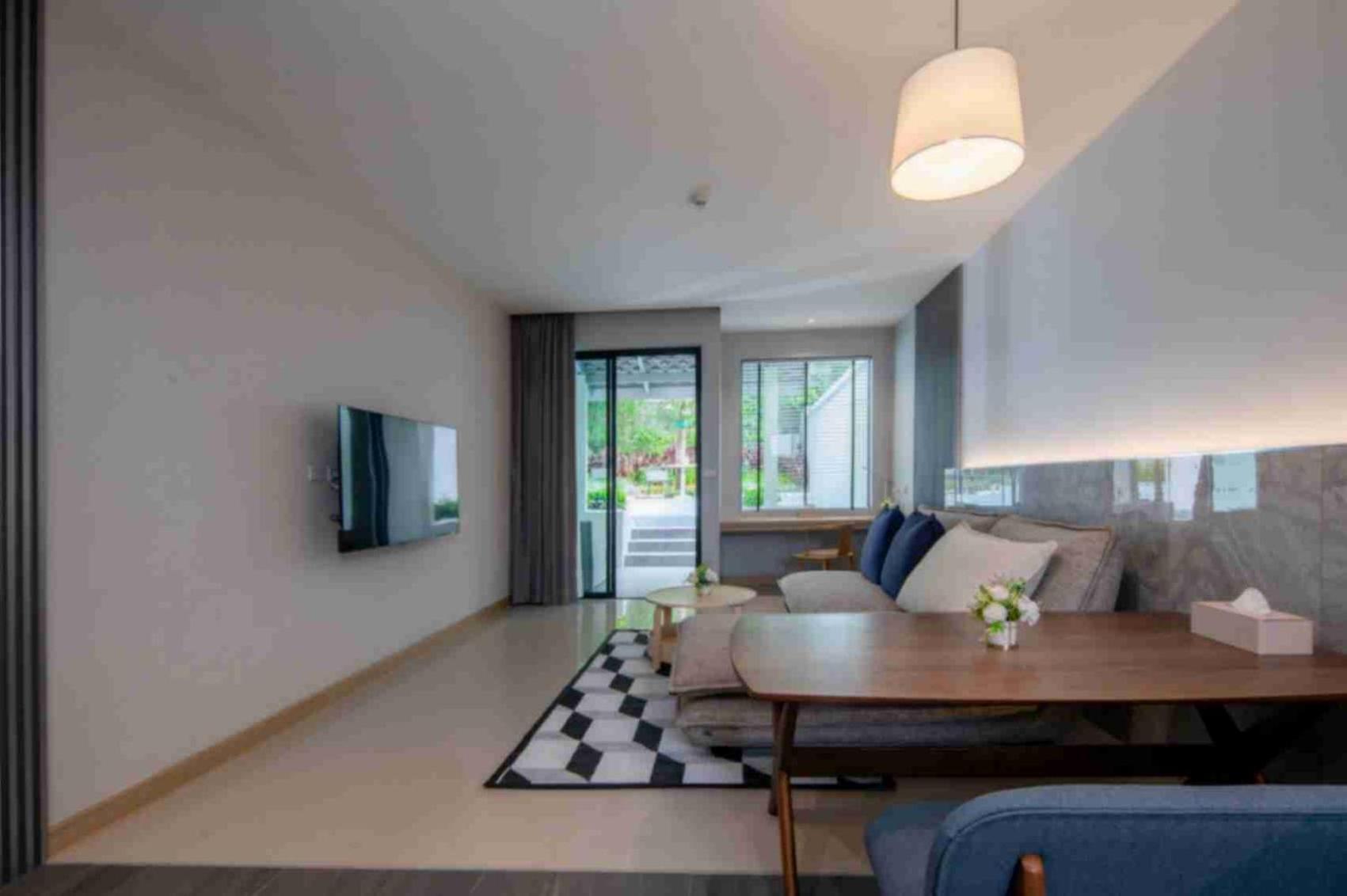 Craft Resort & Villas, Phuket Town Экстерьер фото A living room in a typical landed property in Singapore.